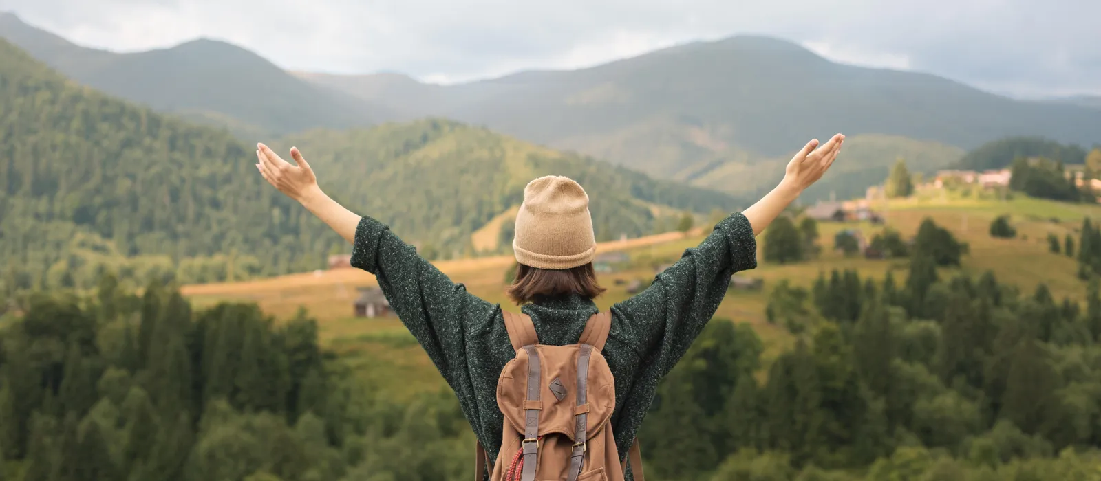 1767967329-young-female-traveler-enjoying-rural-surroundings