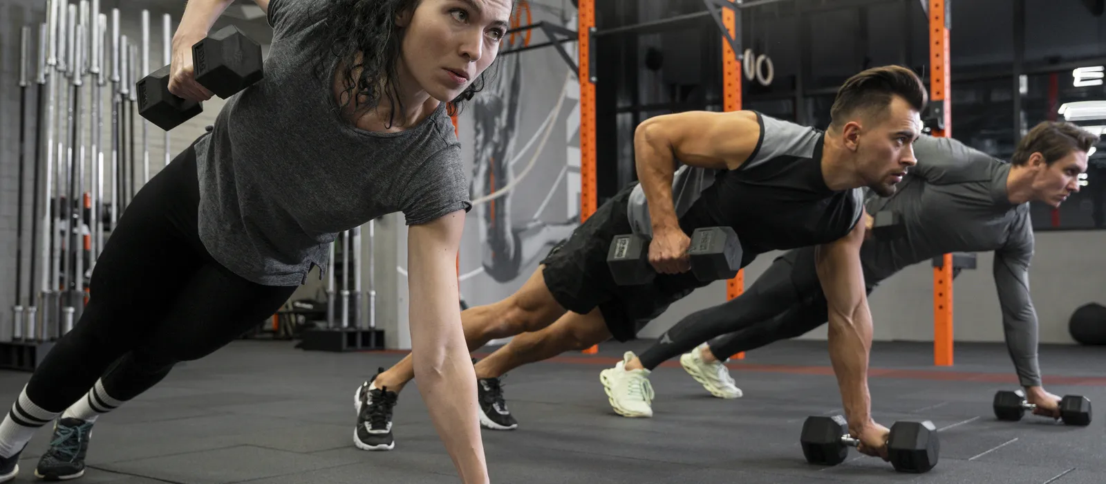 1769097514-people-working-out-indoors-together-with-dumbbells