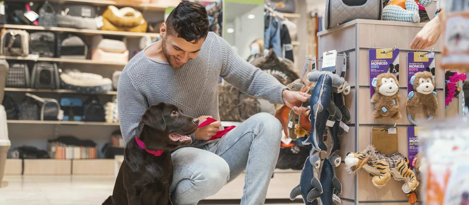 1769868891-cute-dog-with-owner-pet-shop