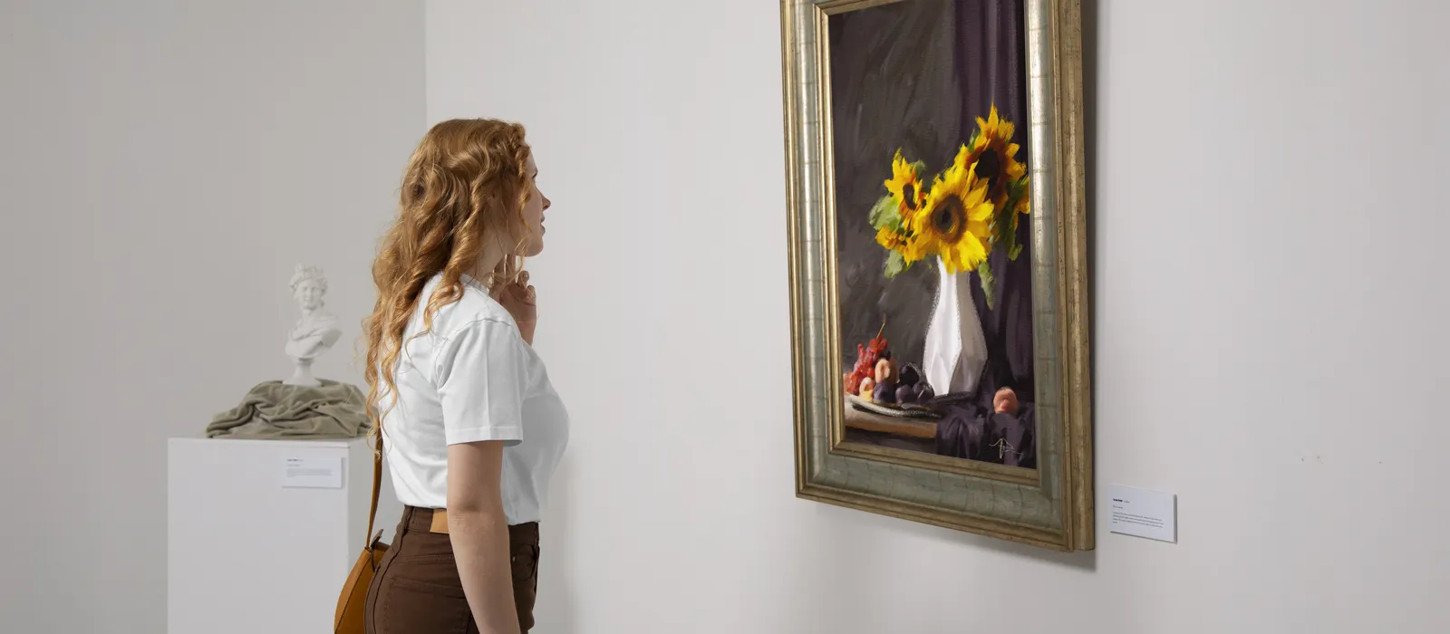 1769854316-side-view-woman-looking-painting
