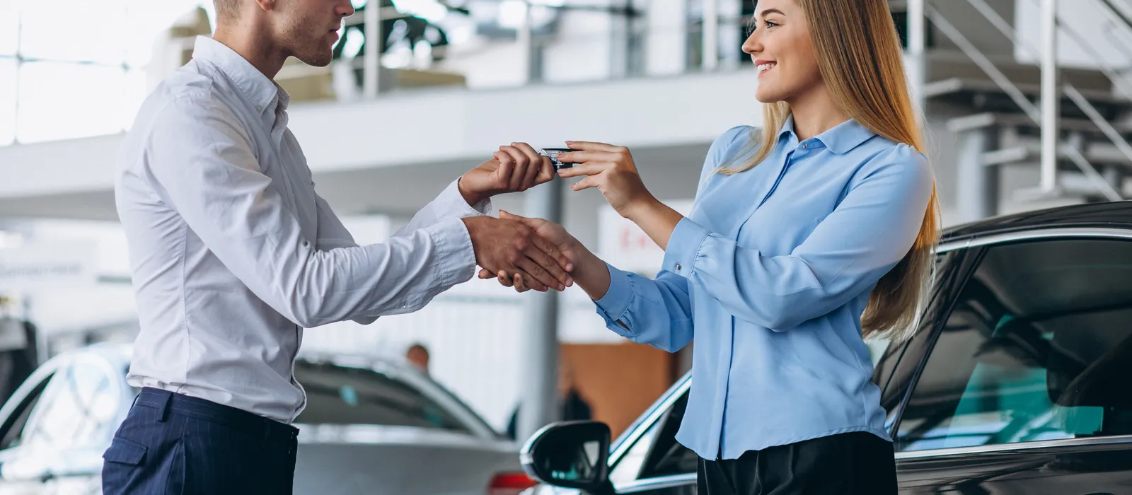 1778314618-customer-making-purchase-car-showroom